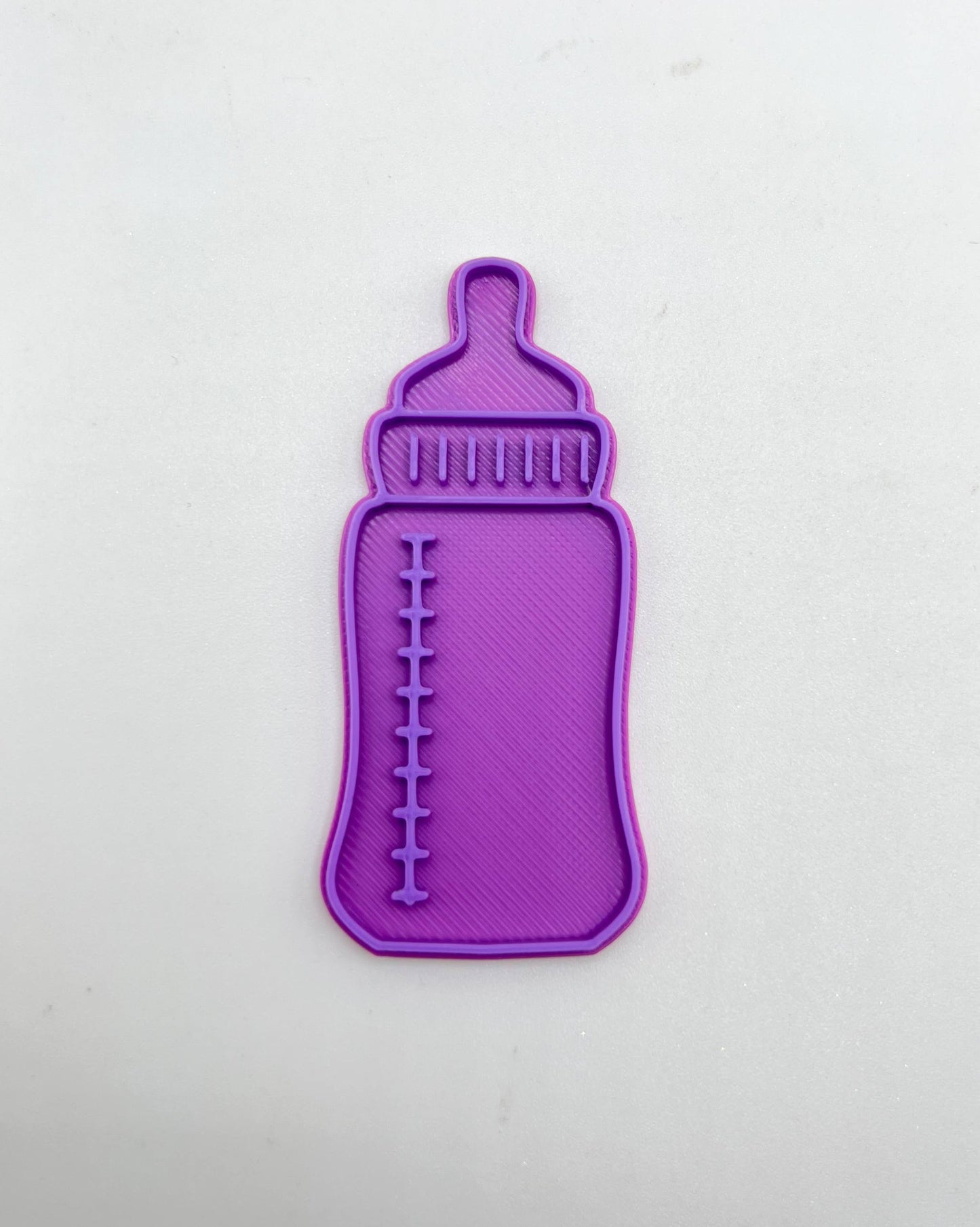 بزة
baby milk bottle cutter and stamp
