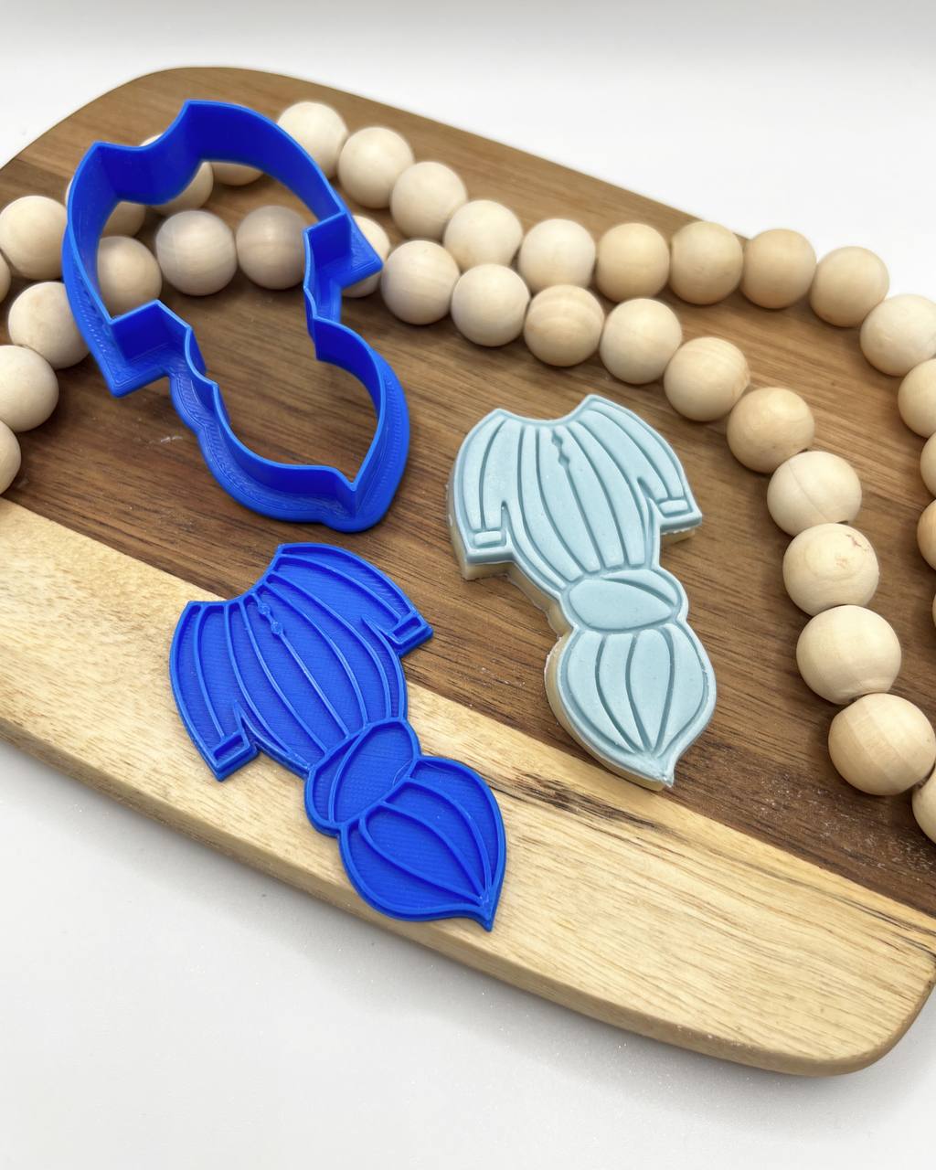 قطاعة مواليد بربتوز مواليد مربوط
knotted onesie cookie cutter and