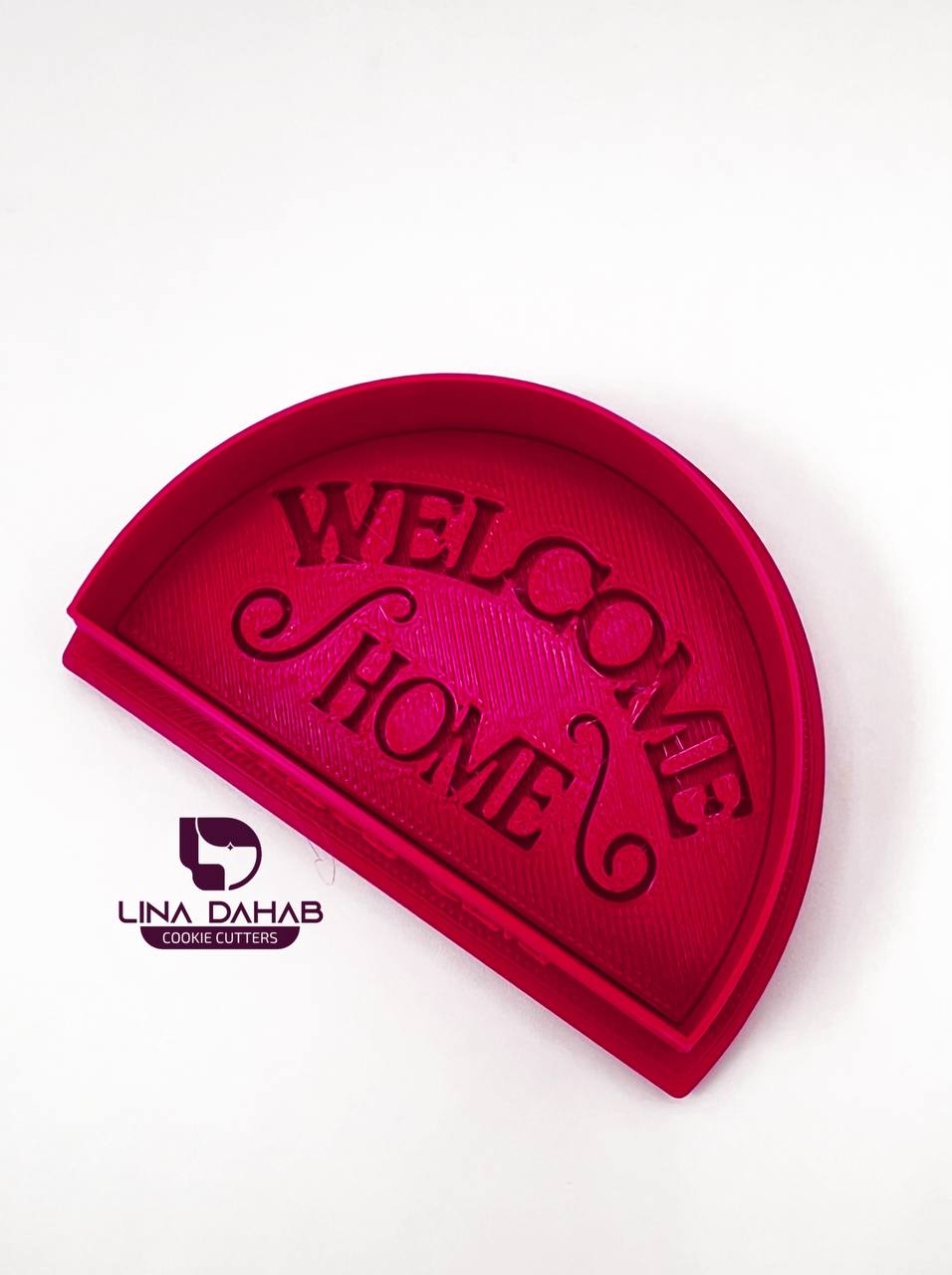قطاعة و ختم عبارة WELCOME HOME
