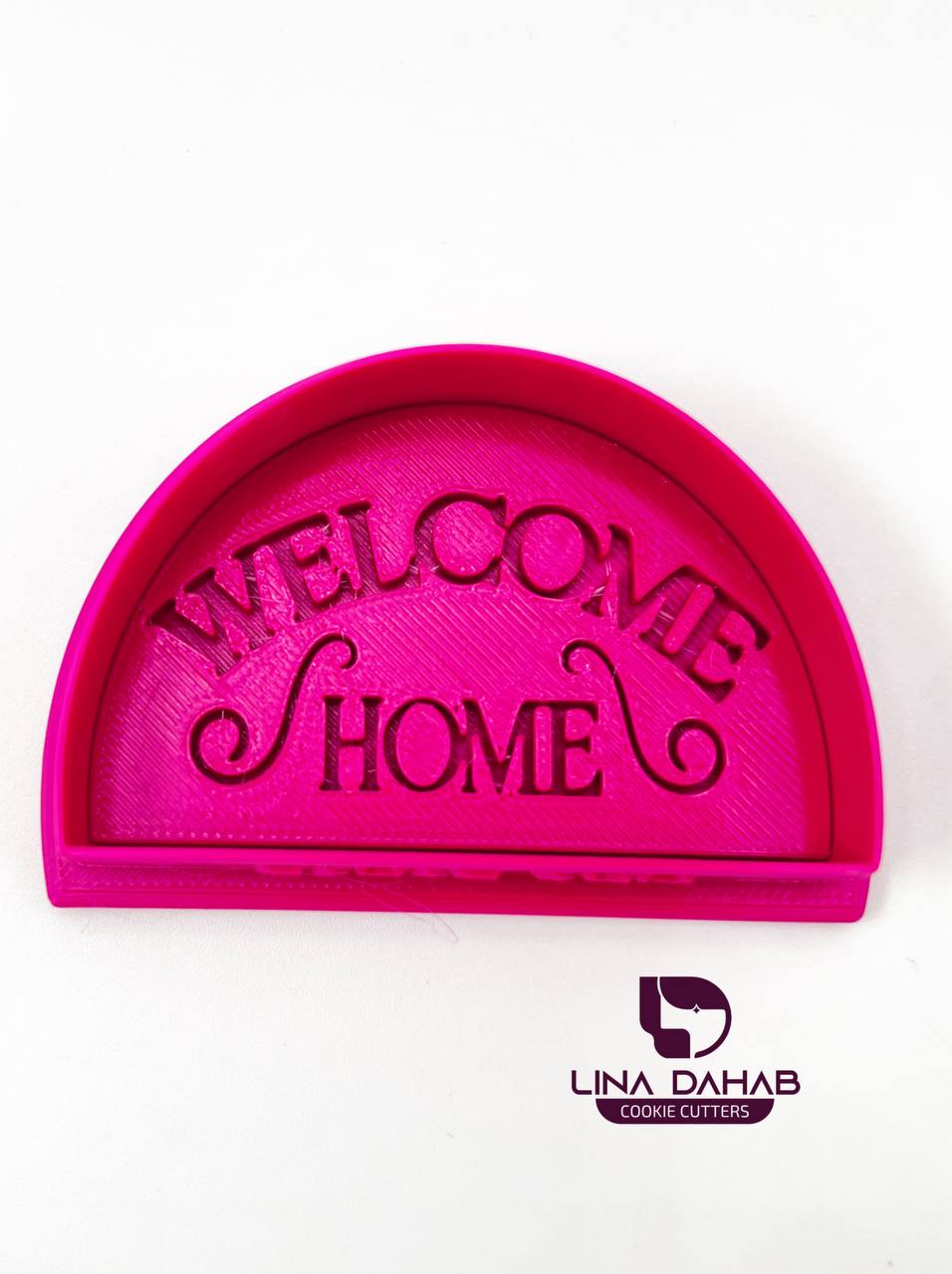 قطاعة و ختم عبارة WELCOME HOME