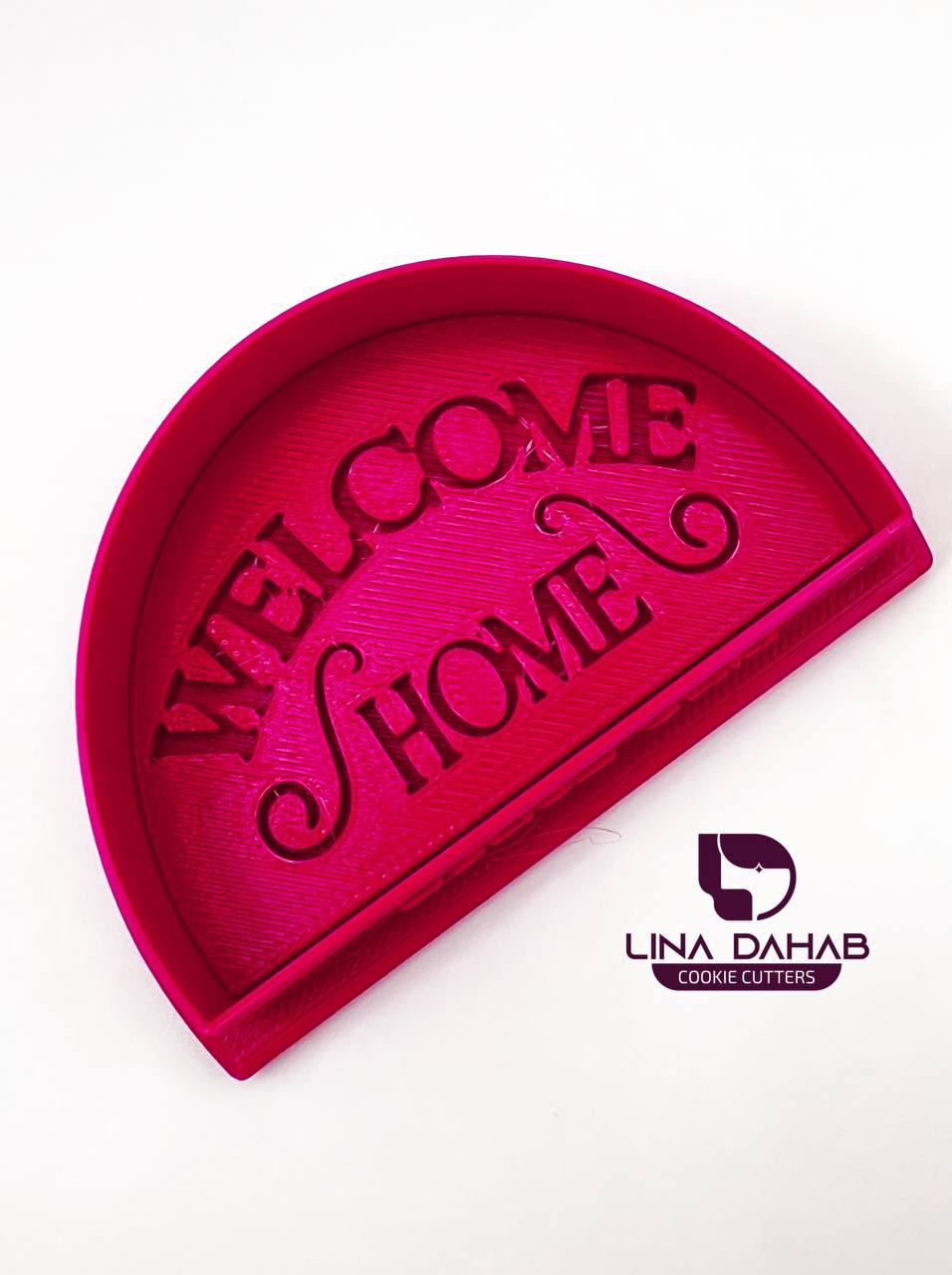 قطاعة و ختم عبارة WELCOME HOME