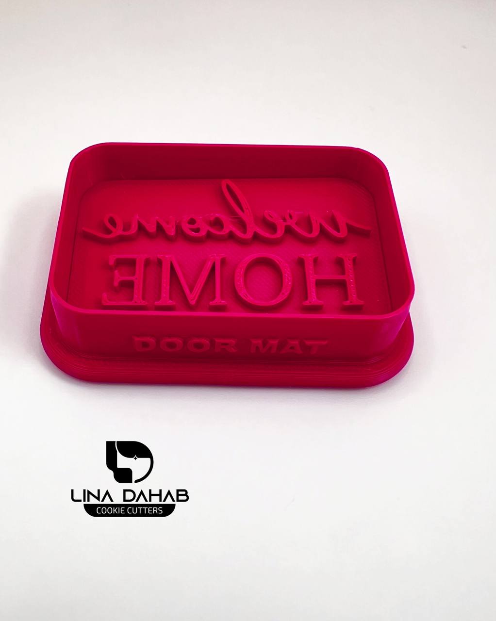 قطاعة و ختم عبارة WELCOME HOME