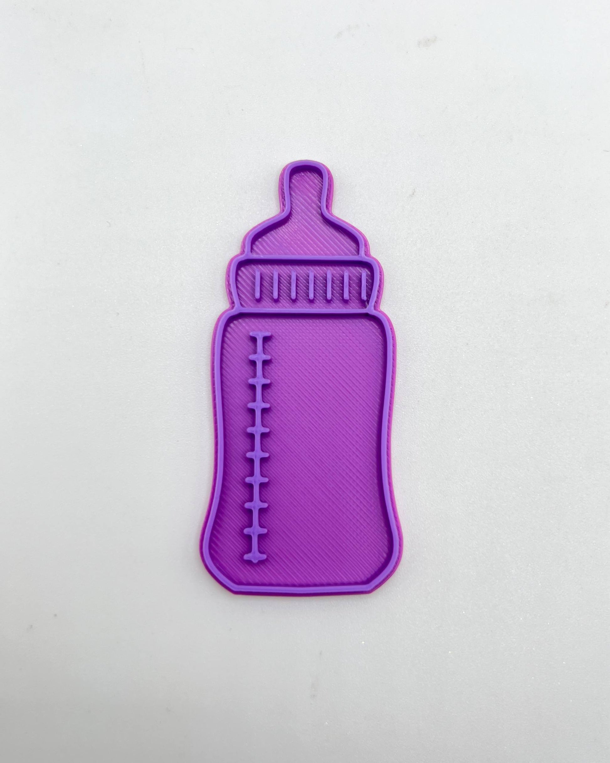 بزة
baby milk bottle cutter and stamp